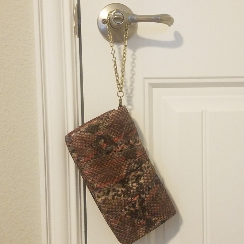 *3 FOR $13* Nine West Snakeskin-look Clutch